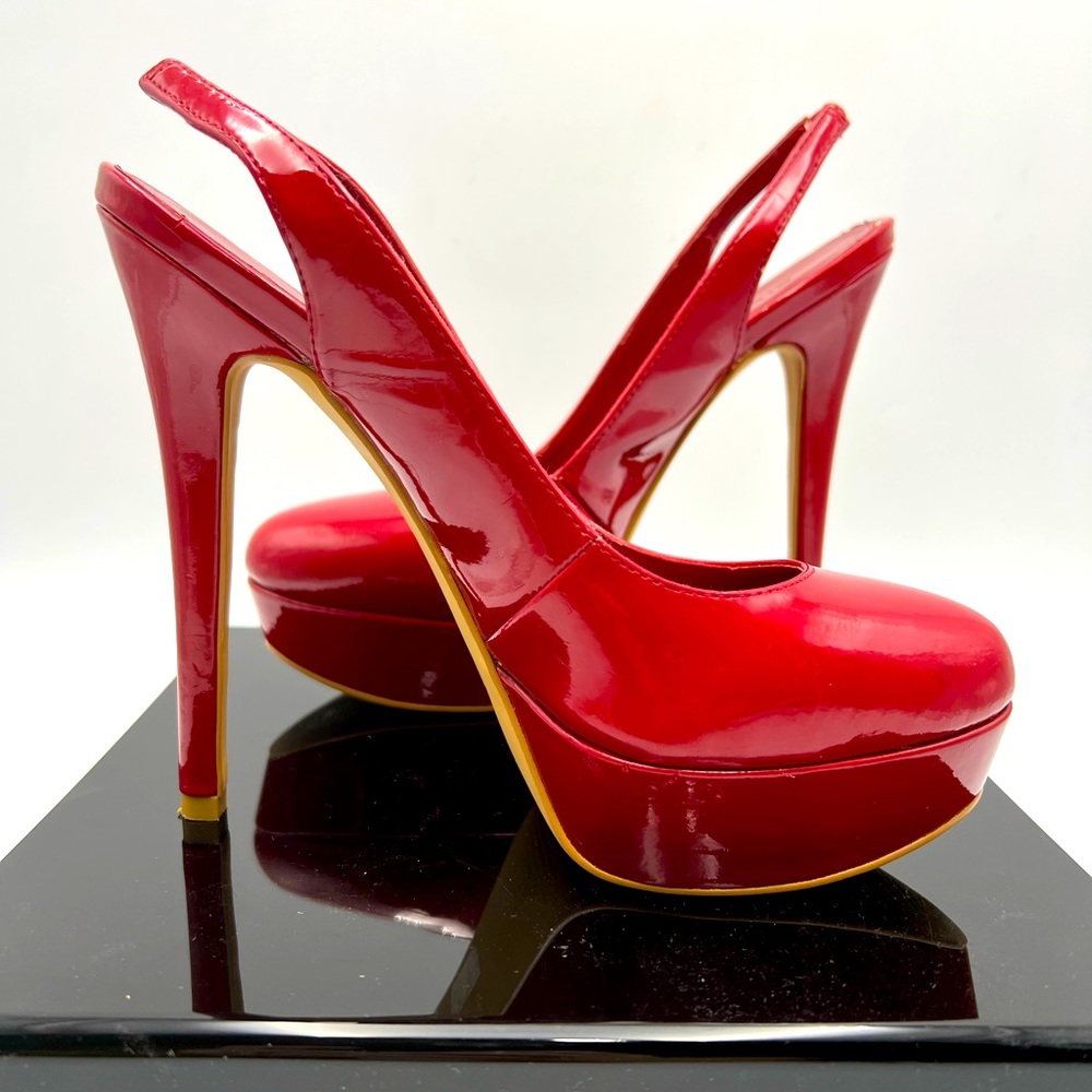 Red, patent platform sling. 6 inch heel.